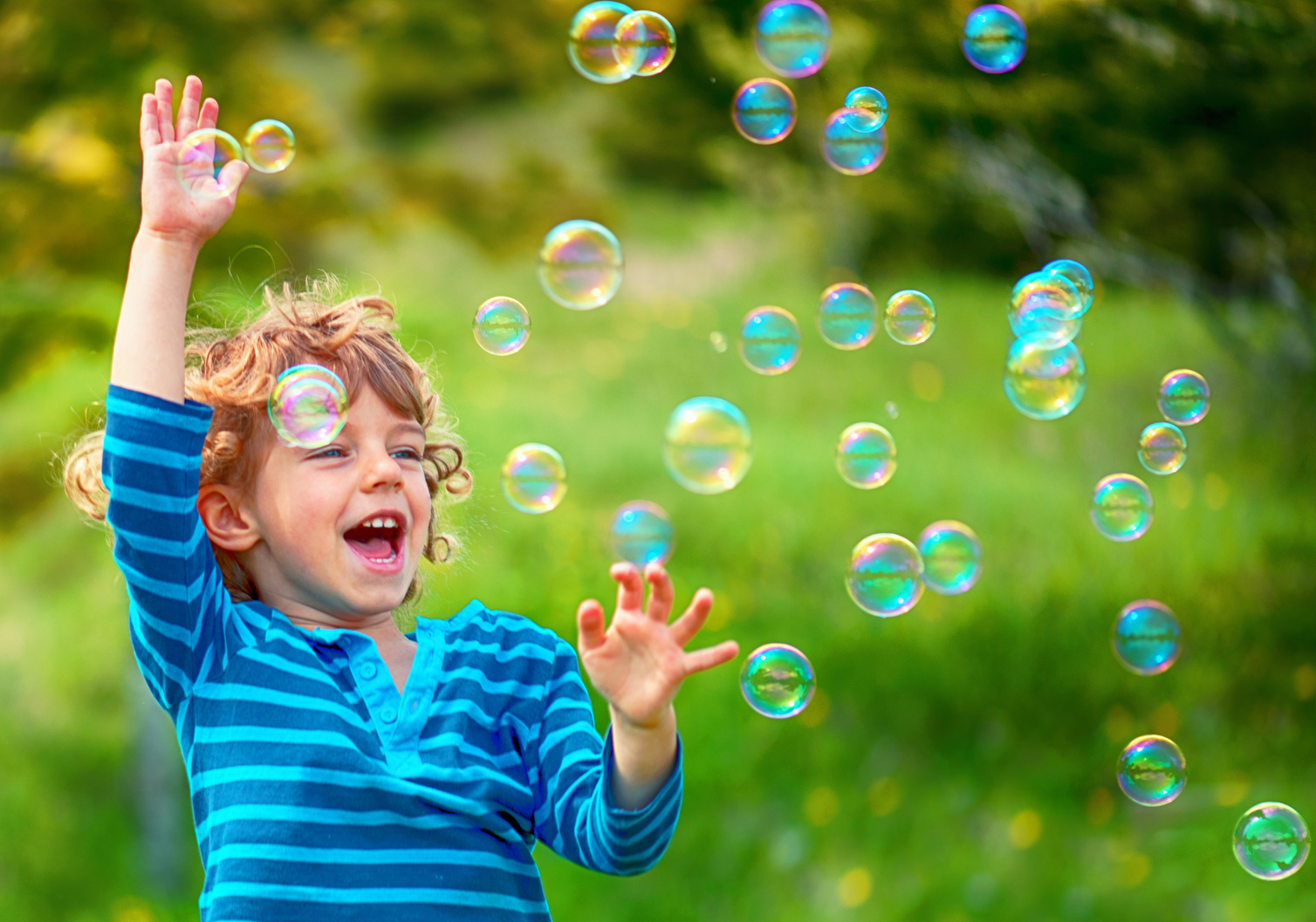 Child and Soap Bubbles